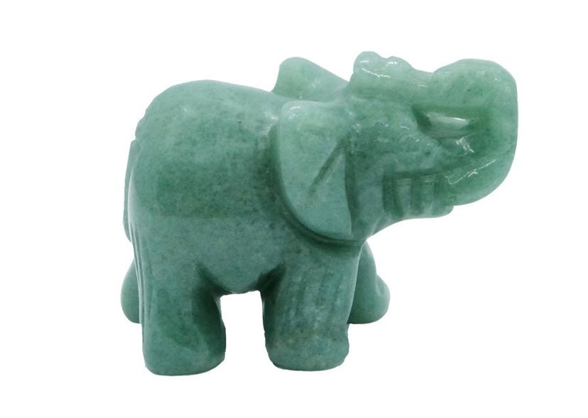Aventurine elephant carving, crystal figurine symbolising luck, prosperity and growth