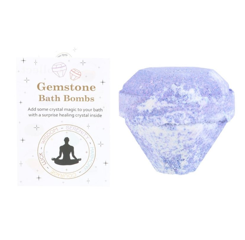 A purple gemstone bath bomb with a sparkling effect, next to its packaging that reads 'Gemstone Bath Bombs' and 'Add some crystal magic to your bath with a surprising healing crystal inside