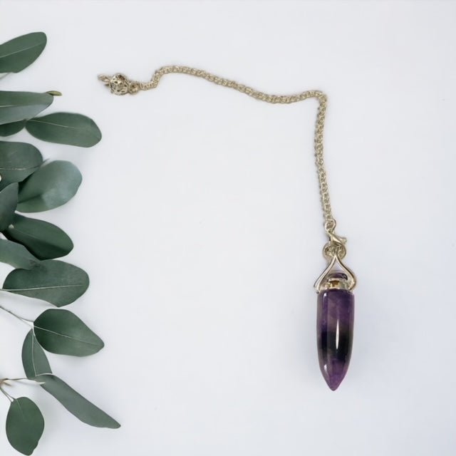 Amethyst pendulum crystal for divination, dowsing and spiritual guidance.