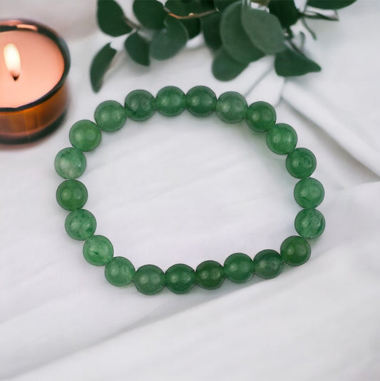 Healing aventurine gemstone bead bracelet, spiritual accessory for growth and positivity.