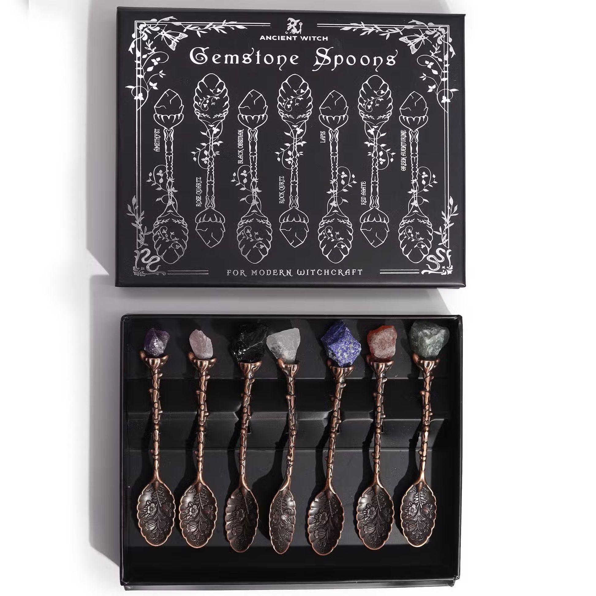 Set of 7 gemstone ritual spoons with bronze-toned floral handles